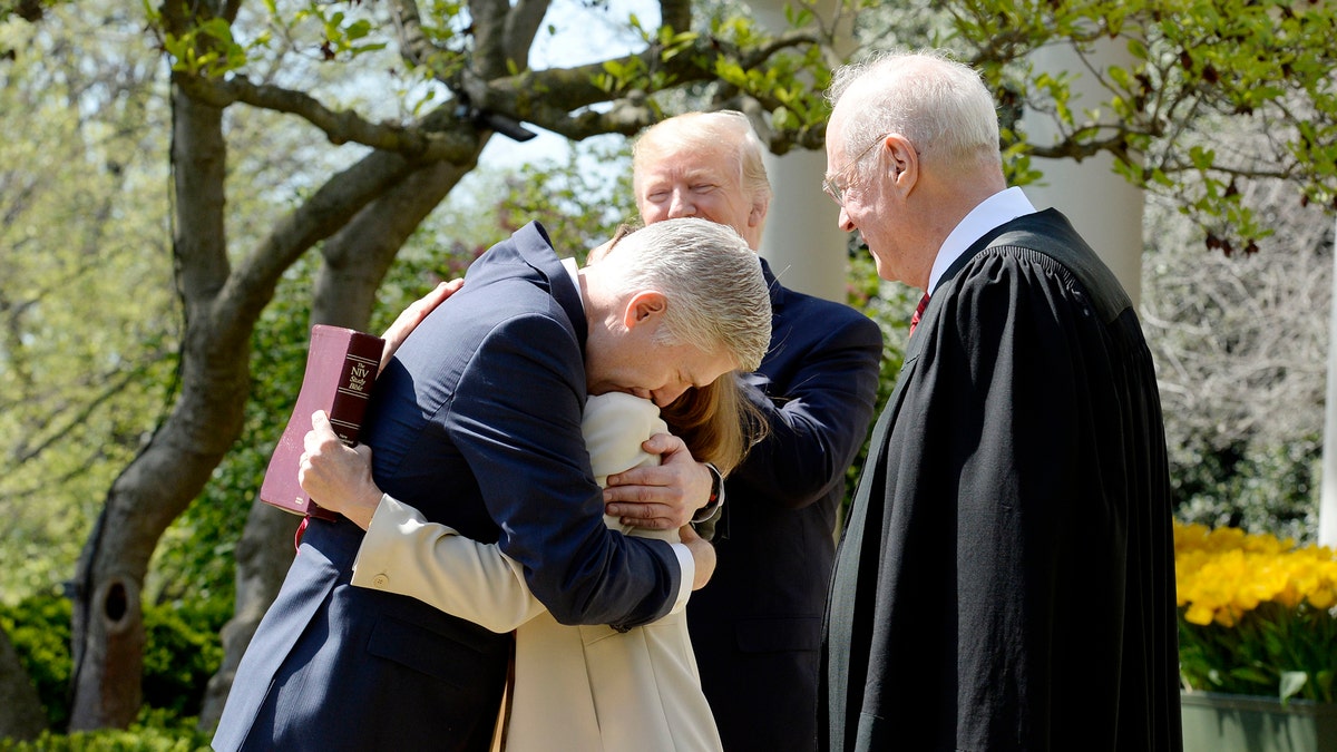 Justice Anthony Kennedy swears in Neil Gorsuch as an Associa