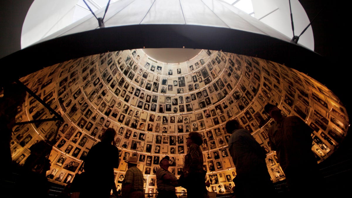 Viktor Orbán claims Budapest is safest city for Jews in all of Europe 2 Visitors look at pictures of Jews killed in the Holocaust in the Hall of Names in the Yad Vashem Holocaust Memorial in Jerusalem, Sunday, April 7, 2013. The annual Israeli memorial day for the 6 million Jews killed in the Holocaust of World War II begins at sundown Sunday. (AP Photo/Sebastian Scheiner)