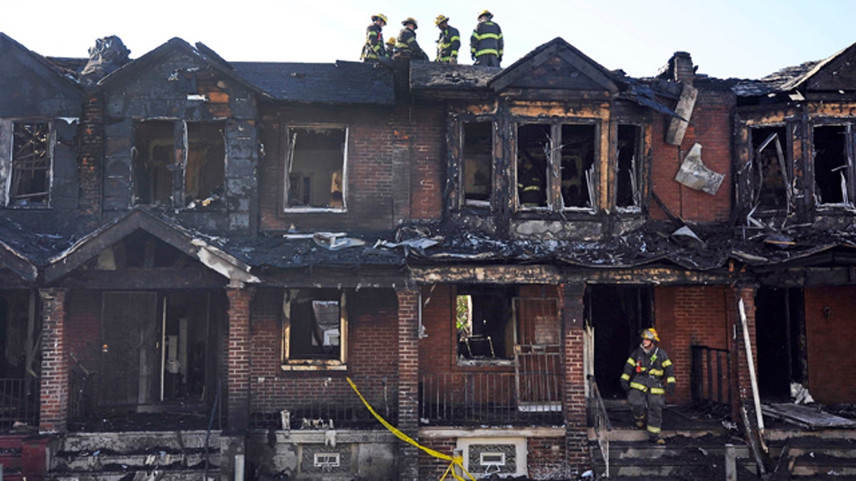 APTOPIX Fatal Row House FIre