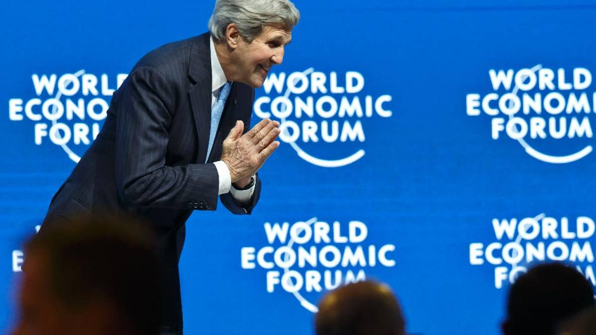 U.S. Secretary of State John Kerry bows 