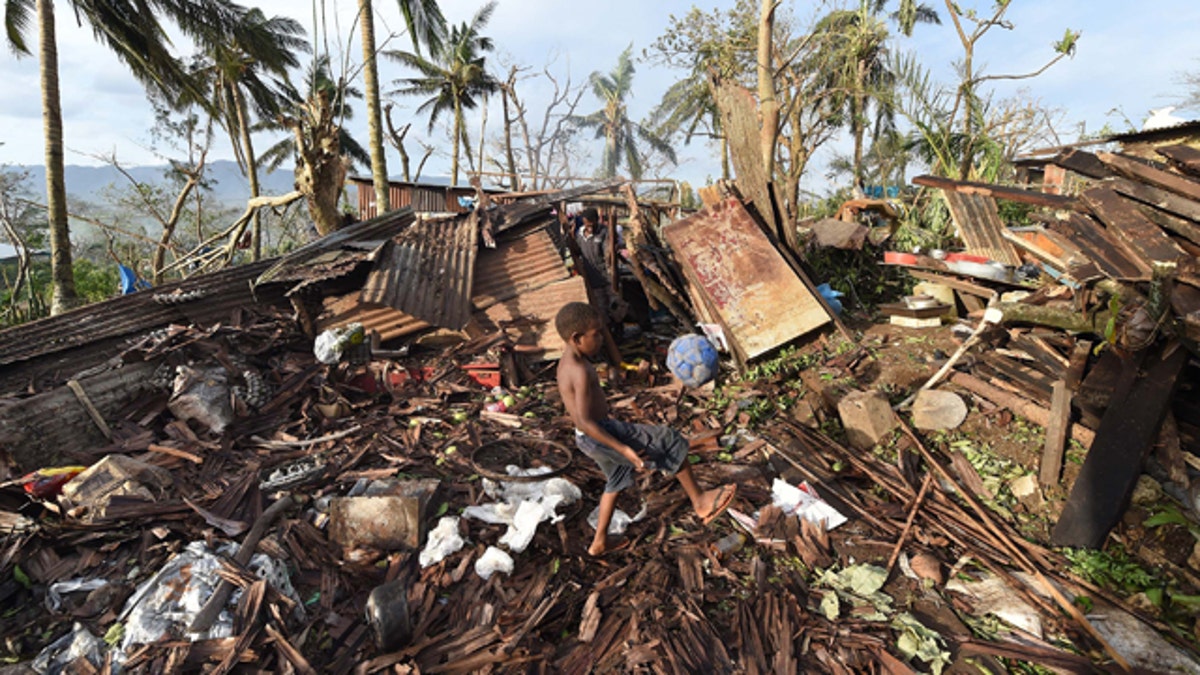 5735c9a6-APTOPIX Vanuatu Cyclone Pam