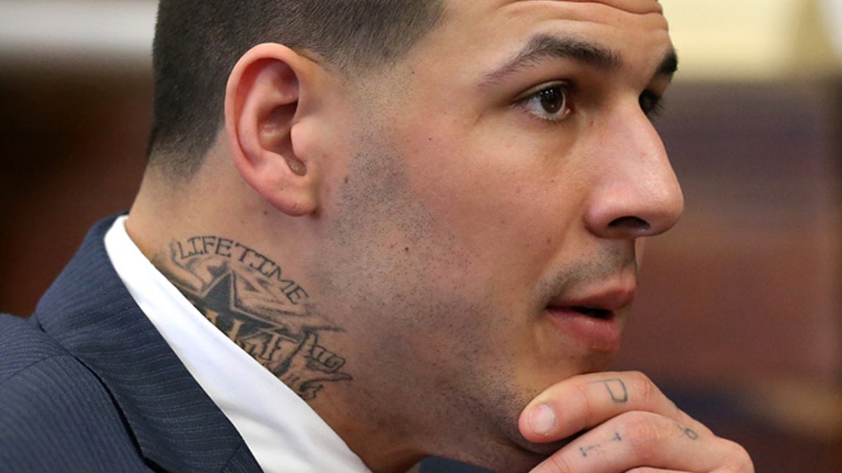 30c565f3-APTOPIX Aaron Hernandez Football