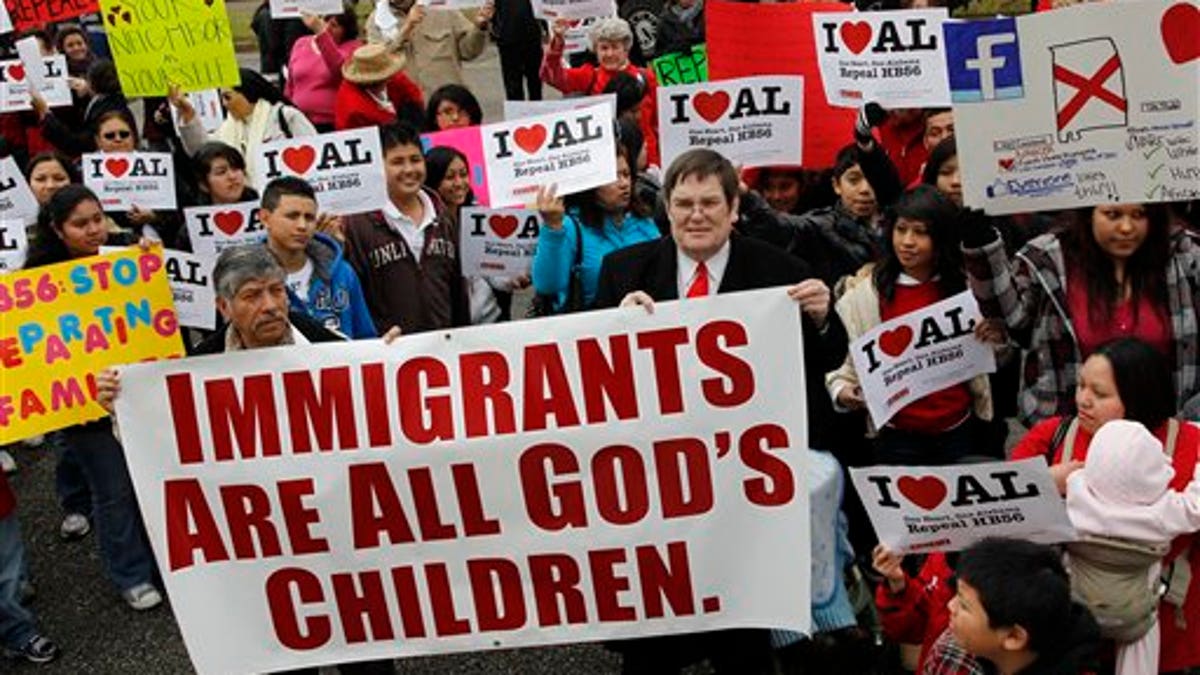 Opponents of Alabama's immigration law gather for a rally outside the Statehouse in Montgomery, Alabama.
