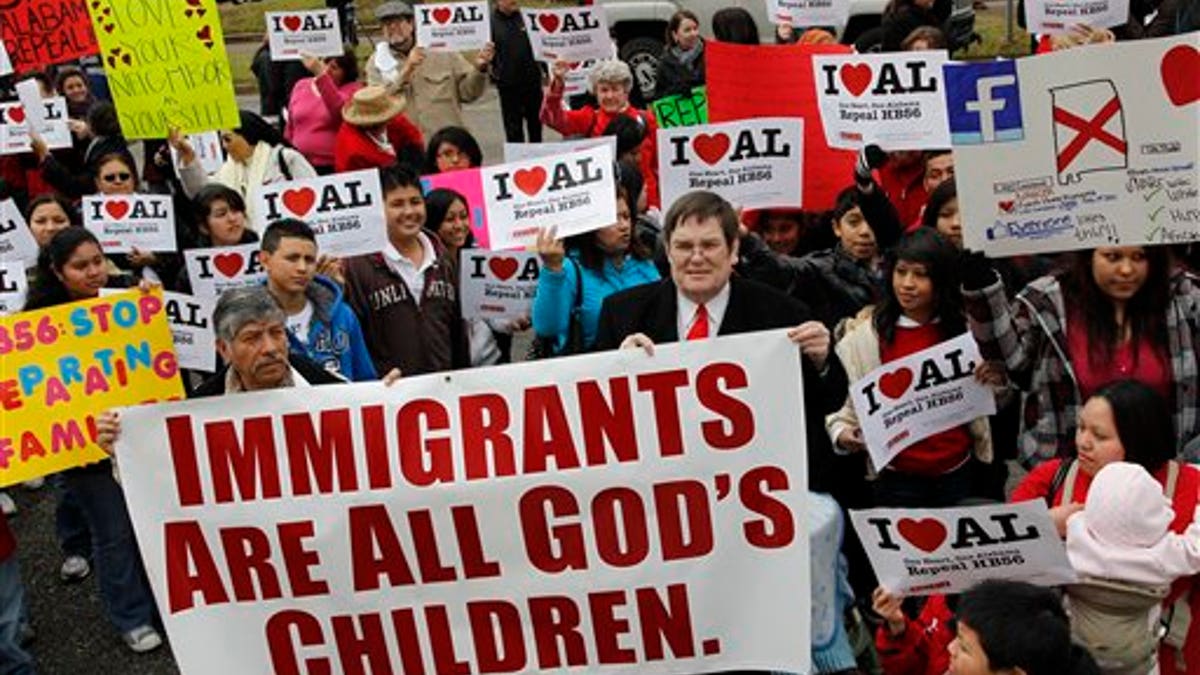 Opponents of Alabama's immigration law gather for a rally outside the Statehouse in Montgomery, Alabama.