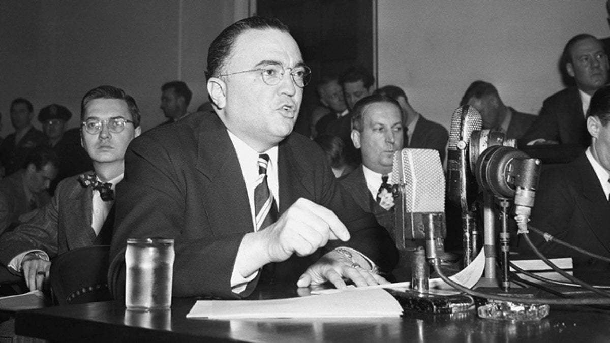 This March 26, 1947, file photo shows Federal Bureau of Investigation Director J. Edgar Hoover calling the communist party of the United States a 