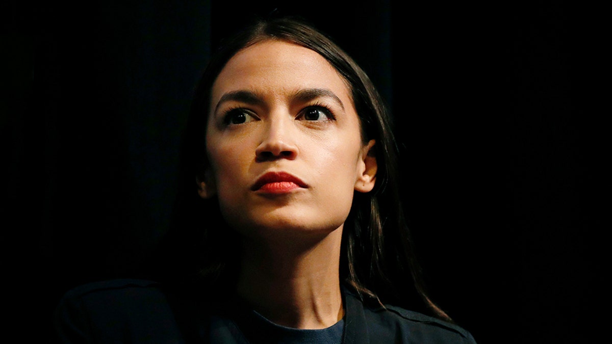 New York congressional candidate Alexandria Ocasio-Cortez listens to a speaker at a fundraiser Thursday, Aug. 2, 2018, in Los Angeles. The 28-year-old startled the party when she defeated 10-term U.S. Rep. Joe Crowley in a New York City Democratic primary. Ocasio-Cortez is a rising liberal star who is challenging the Democratic Party establishment. (AP Photo/Jae C. Hong)