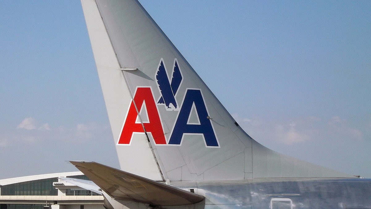 Milwaukee, Michigan, USA - July 14, 2014: Tail section of American Airlines 737 airplane. This aircraft was produced by the Boeing company. 