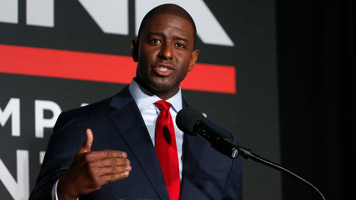 FILE - This July 18, 2018, file photo shows Tallahassee Mayor Andrew Gillum speaking during a Democratic gubernatorial debate held at Florida Gulf Coast University's Cohen Center in Fort Myers, Fla. Gillum, in an effort to answer lingering questions about trips he took that are being investigated by the state's ethics commission, released receipts on Monday, Sept. 3, 2018, that he says show he paid for his travel. Gillum, who last week won the Democratic primary for Florida governor, met Tuesday with investigators from Florida's ethics commission to discuss the trips to Costa Rica and New York City. (AP Photo/Wilfredo Lee, File