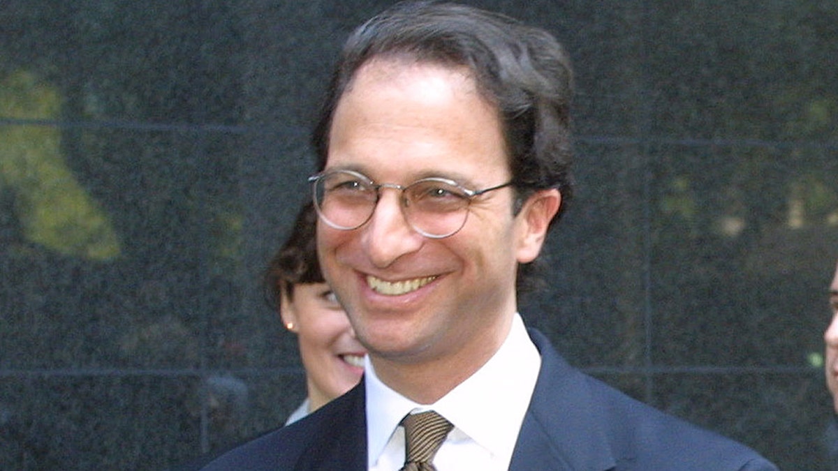 Federal prosecutors Andrew Weissman (L) and Leslie Caldwell smileoutside federal court in Houston June 15, 2002 after a jury found theAndersen accounting firm guilty of obstructing justice in aninvestigation of its client, Enron Corporation. The 12-member jury,which heard nearly five weeks of testimony before U.S. District JudgeMelinda Harmon, found Andersen criminally intended to keep Enron auditrecords away from a U.S. Securities and Exchange Commission inquiry.REUTERS/Richard CarsonRJC/GN - RP3DRHZYNHAB