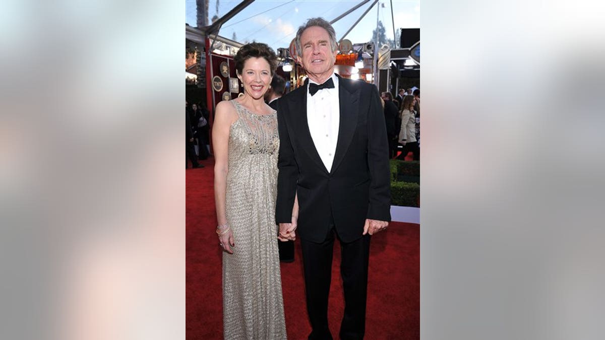 Annette Bening, left, and Warren Beatty arrive at the 17th Annual Screen Actors Guild Awards on Sunday, Jan. 30, 2011 in Los Angeles. (AP Photo/Vince Bucci)