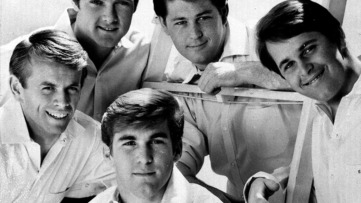 The Beach Boys are shown in this 1966 photo. The group includes three brothers, a cousin and an honorary relative. Left to right top: Mike Love, Brian Wilson and Carl Wilson. Bottom, Al Jardine and Dennis Wilson. (AP Photo)