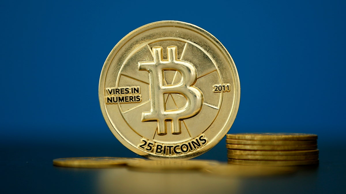 Bitcoin (virtual currency) coins are seen in an illustration picture taken at La Maison du Bitcoin in Paris, France, May 27, 2015. 