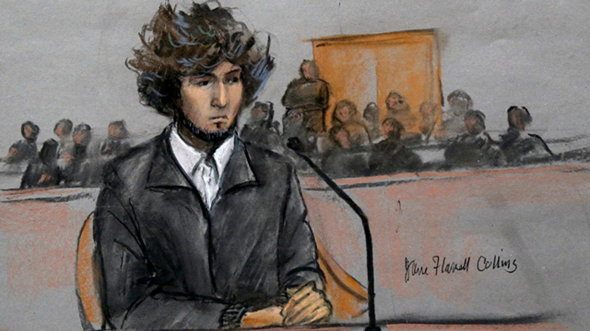 FILE - In this Dec. 18, 2014, courtroom sketch, Boston Marathon bombing suspect Dzhokhar Tsarnaev sits in federal court in Boston. (Jane Flavell Collins via AP, File)