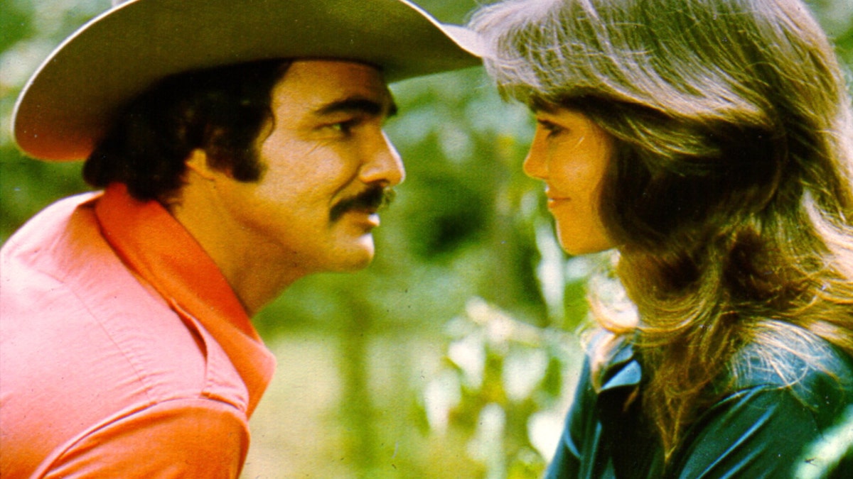 1977:  Actors Burt Reynolds and Sally Field in the film 'Smokey and the Bandit'. (Photo by Michael Ochs Archives/Getty Images)