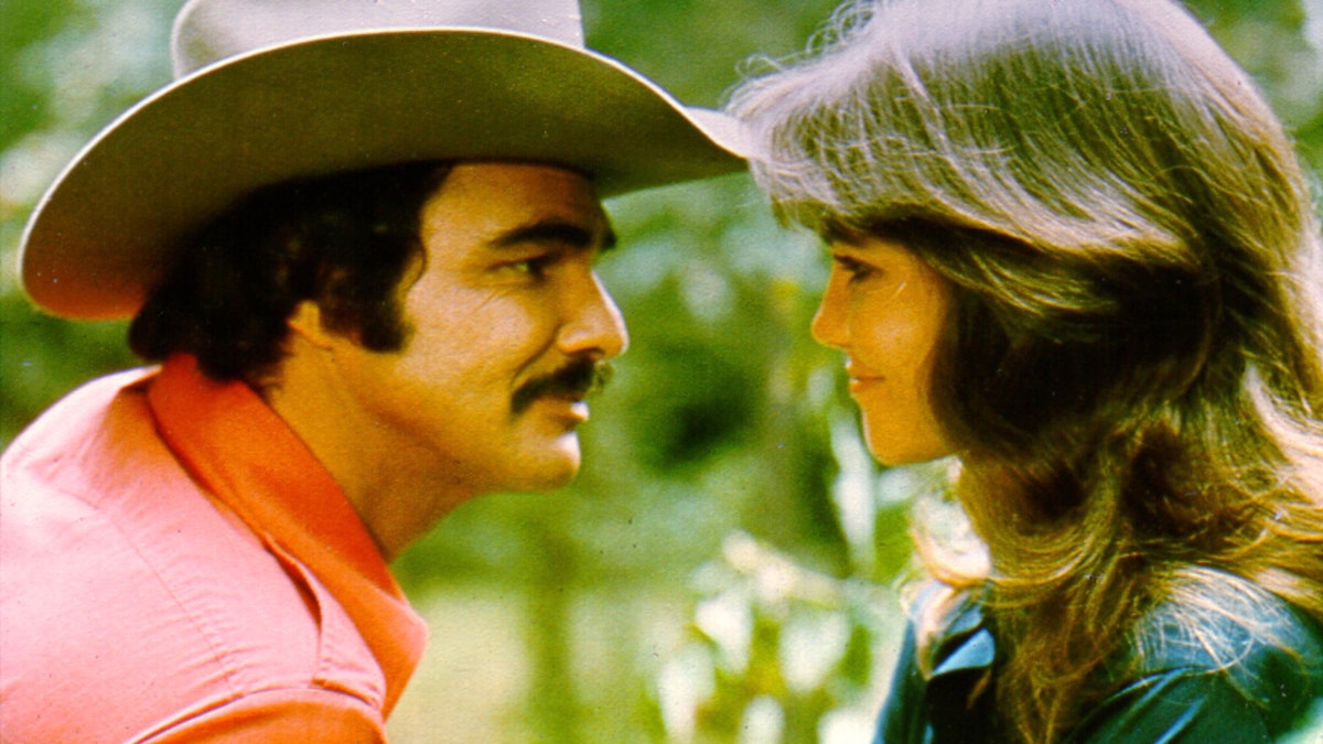 1977:  Actors Burt Reynolds and Sally Field in the film 'Smokey and the Bandit'. (Photo by Michael Ochs Archives/Getty Images)