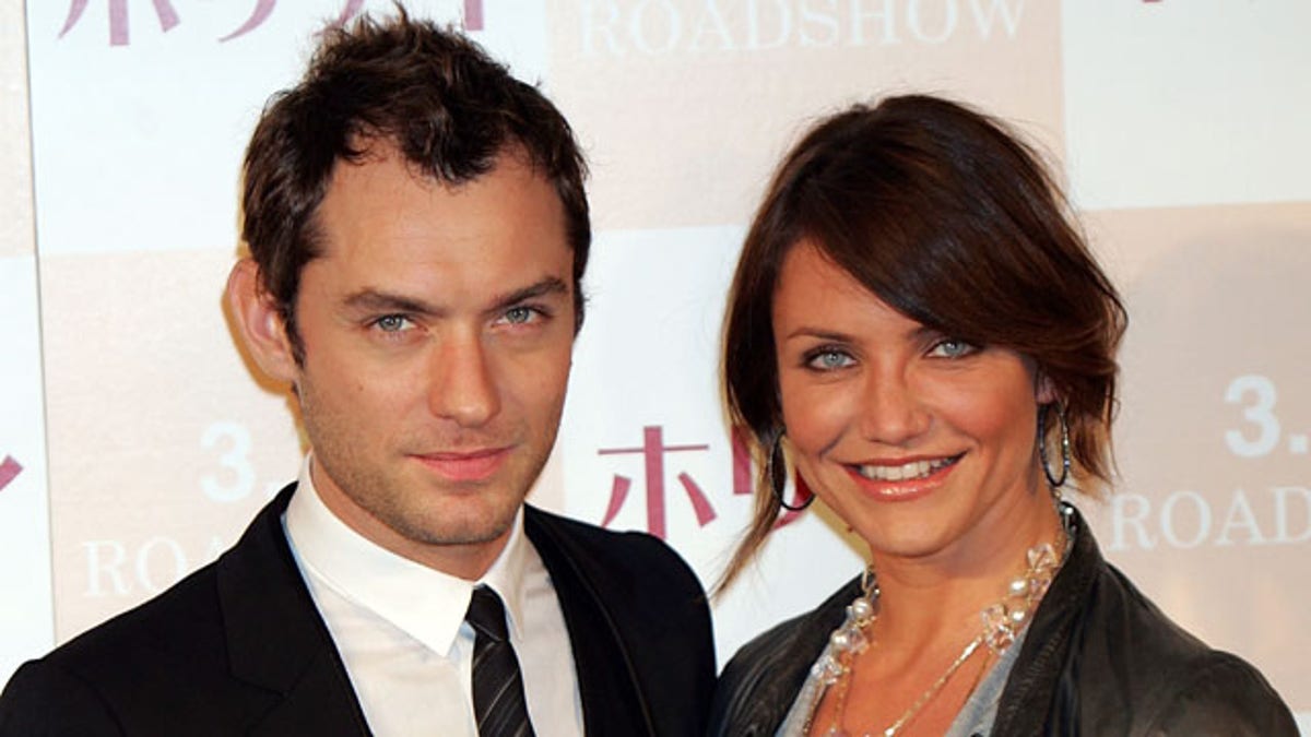 TOKYO - MARCH 14: Actress Cameron Diaz and actor Jude Law attend a photo call and press conference to promote their latest film 