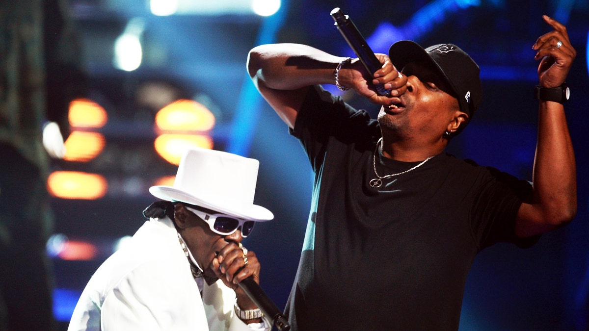 NEW YORK - SEPTEMBER 23:  Rappers Flavor Flav (L) and Chuck D of Public Enemy perform onstage at the 2009 VH1 Hip Hop Honors at the Brooklyn Academy of Music on September 23, 2009 in the Brooklyn borough of New York City.  (Photo by Stephen Lovekin/Getty Images)