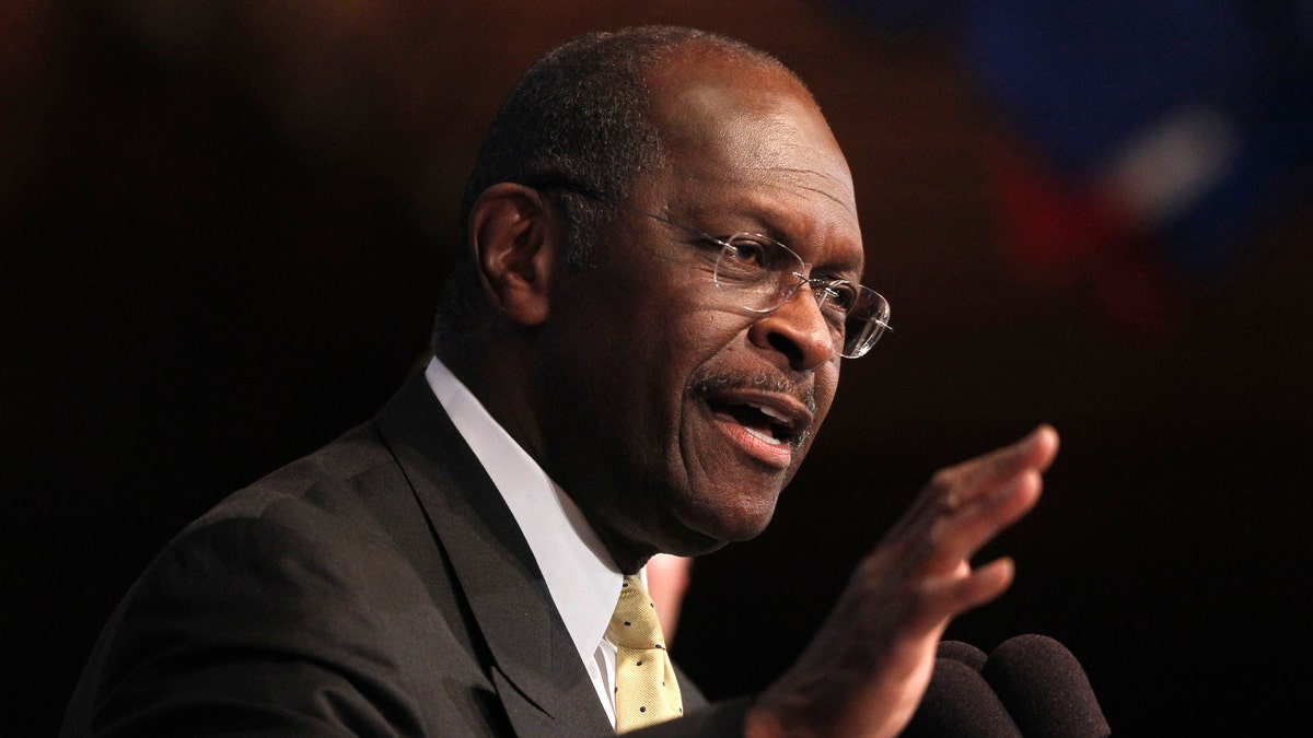 Republican presidential candidate, Herman Cain sings for members of the audience at the National Press Club in Washington, Monday, Oct. 31, 2011. (AP Photo/Pablo Martinez Monsivais)