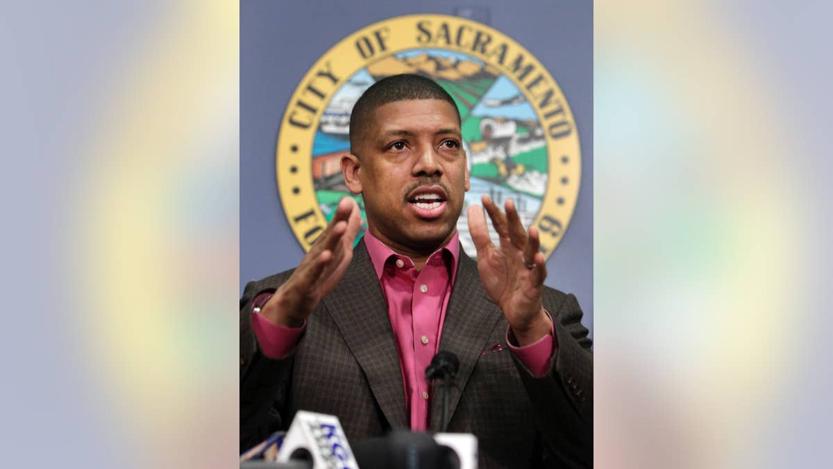 FILE - In this Jan. 9, 2013 file photo, Sacramento Mayor Kevin Johnson speaks during a news conference in Sacramento, Calif.  In January,  black activist Maile Hampton was arrested during a Black Lives Matter protest in Sacramento and charged with felony lynching. The charge for interfering with police during an arrest drew outrage from African-American leaders including Johnson who noted the irony of the charge. A bill by state Sen. Holly Mitchell, D-Los Angeles, to remove the word 