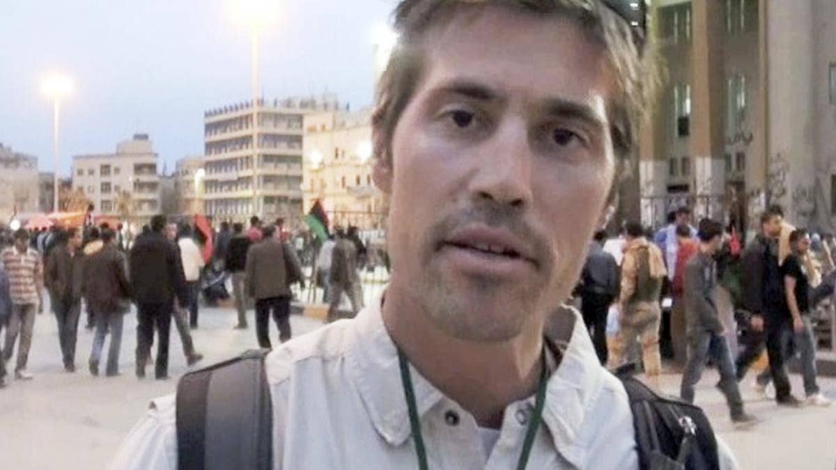 This undated still image from video released Thursday, April 7, 2011 by GlobalPost, shows James Foley of Rochester, N.H., a freelance contributor for GlobalPost, in Benghazi, Libya. GlobalPost said it has been told Foley was taken prisoner in Libya on Tuesday, April 5, 2011. (AP Photo/GlobalPost)