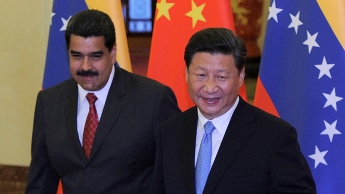 BEIJING, CHINA - SEPTEMBER 1: Chinese President Xi Jinping meets with Venezuela's President Nicolas Maduro at the Great Hall of the People September 1, 2015 in Beijing, China. Maduro is visiting China seeking financial assistance as Venezuela has been hit hard by recession. (Photo by Parker Song-Pool/Getty Images)