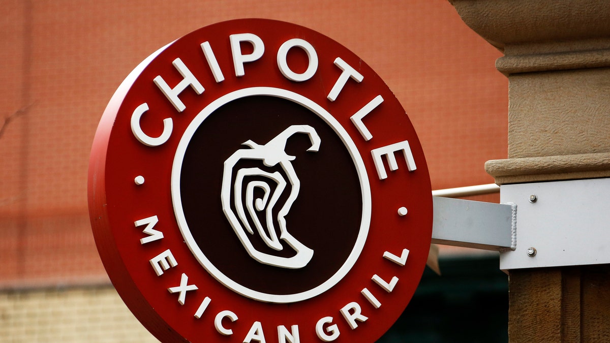 This Thursday, Jan. 12, 2017, photo, shows the sign on a Chipotle restaurant in Pittsburgh. Chipotle Mexican Grill, Inc. reports financial results, Tuesday, July 25, 2017. (AP Photo/Gene J. Puskar)
