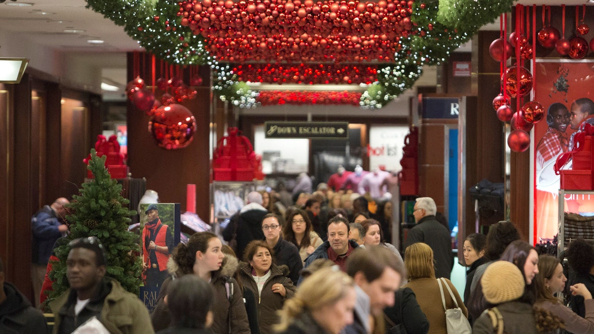 NEW YORK, NY - NOVEMBER 23: Shoppers fill Macy's during the Black Friday sales on November 23, 2012 in New York City. Black Friday, the official start of the holiday shopping season and busiest shopping day of the year for many retailers got it's name as it's said to put retailers 'in the black'. (Photo by Andrew Kelly/Getty Images)
