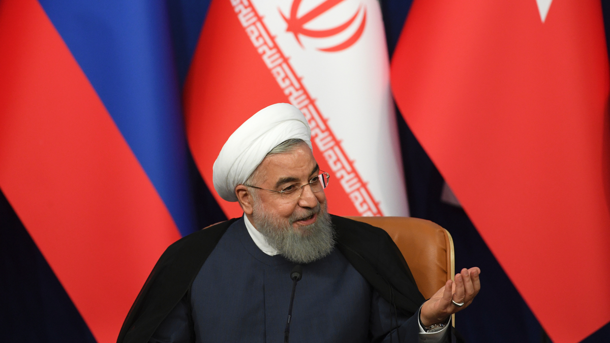 Iran's President Hassan Rouhani attends a news conference following the Russia-Iran-Turkey summit in Iran on Friday, Sept. 7, 2018. (Kirill Kudryavtsev/Pool Photo via AP)