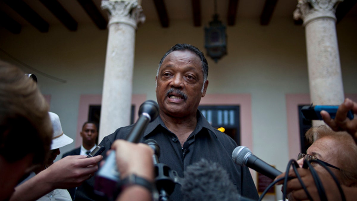 Rev. Jesse Jackson talks with journalists after a meeting with members of the Revolutionary Armed Forces of Colombia, or FARC, at the Hotel Nacional in Havana, Cuba, Sunday, Sept. 29, 2013. Jackson says he intends to press forward in a bid to mediate the release of a U.S. Army veteran taken captive by Colombian rebels three months ago. (AP Photo/Ramon Espinosa)