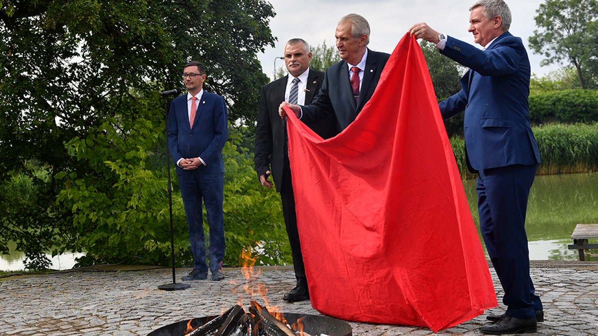 Czech president burns giant pair of red underwear in bizarre press stunt