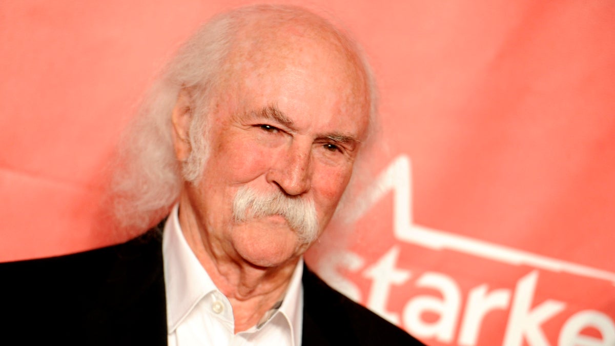 FILE - In this Feb. 6, 2015 file photo, David Crosby arrives at the 2015 MusiCares Person of the Year event at the Los Angeles Convention Center in Los Angeles. The Rock and Roll Hall of Famer Crosby hit and injured a jogger with his car in Southern California. The California Highway Patrol said in a statement that Crosby was driving his Tesla electric car Sunday, March 22, 2015, at around 55 mph, the posted speed limit on the road in the Santa Barbara area where Crosby lives. (Photo by Richard Shotwell/Invision/AP, File)