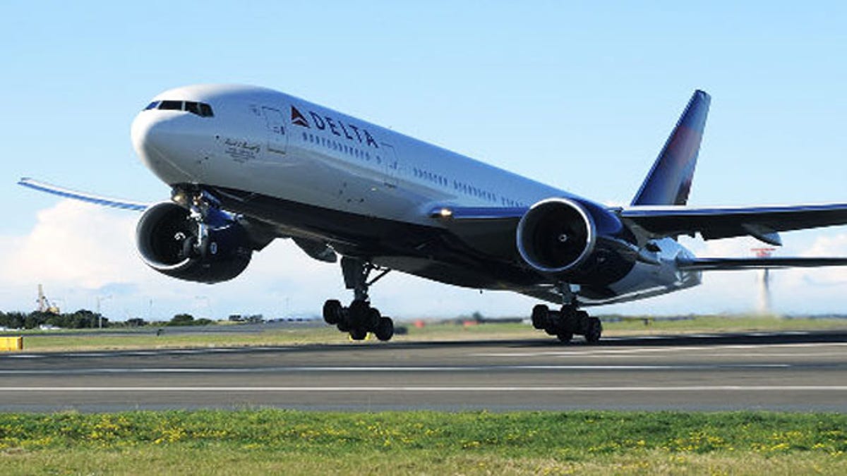 FILE: A Delta Airlines plane takes off on its inaugural Sydney to Los Angeles flight from Sydney International Airport.