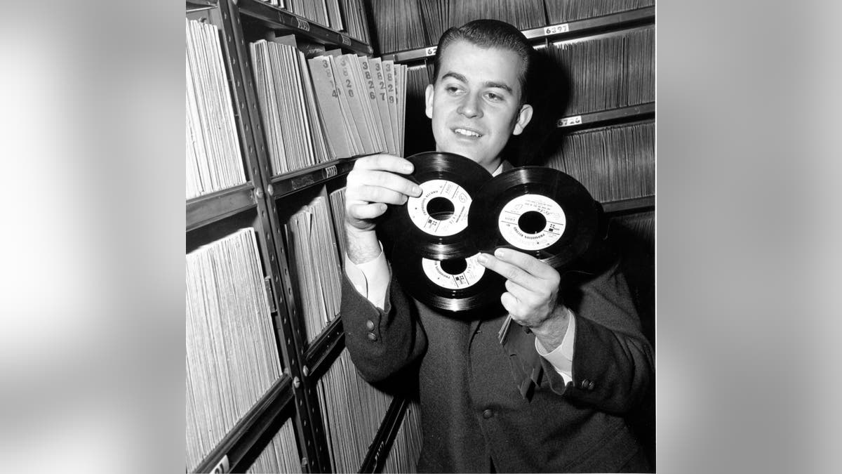 Dick Clark picking records in 1959