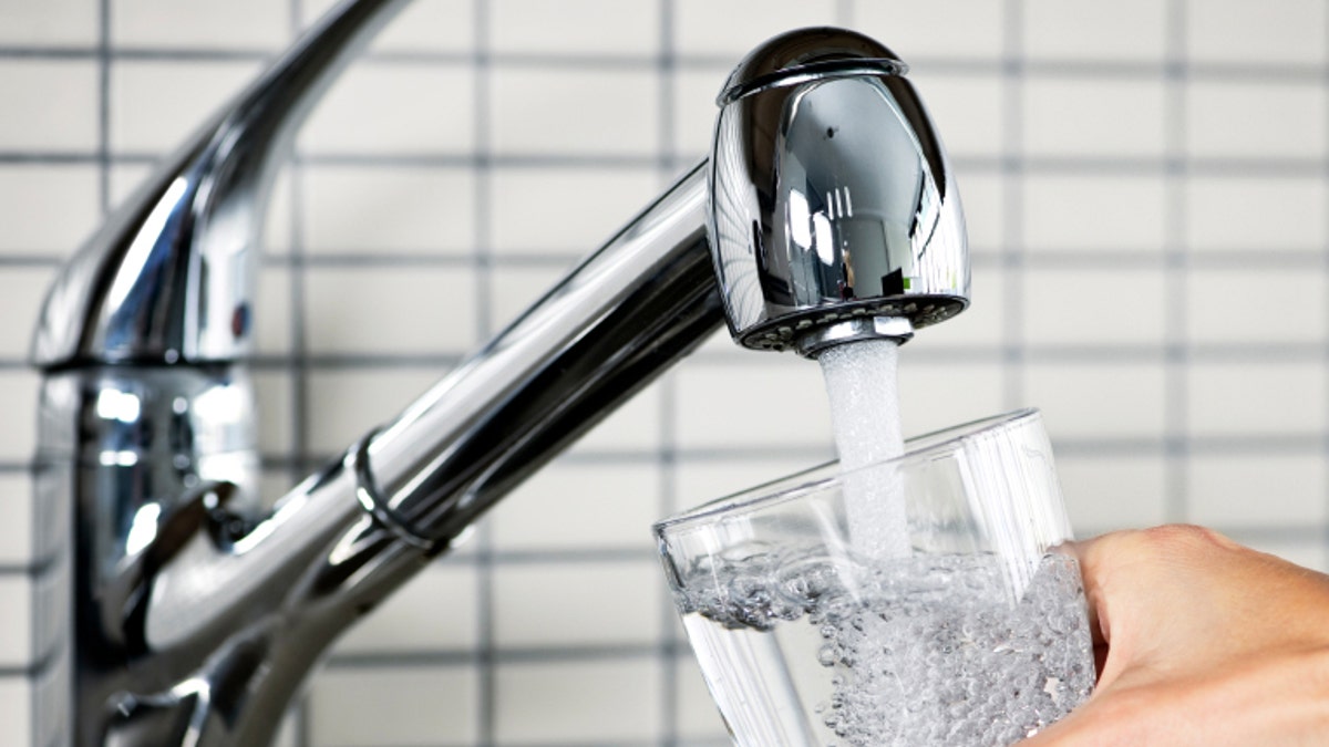 Filling glass of tap water