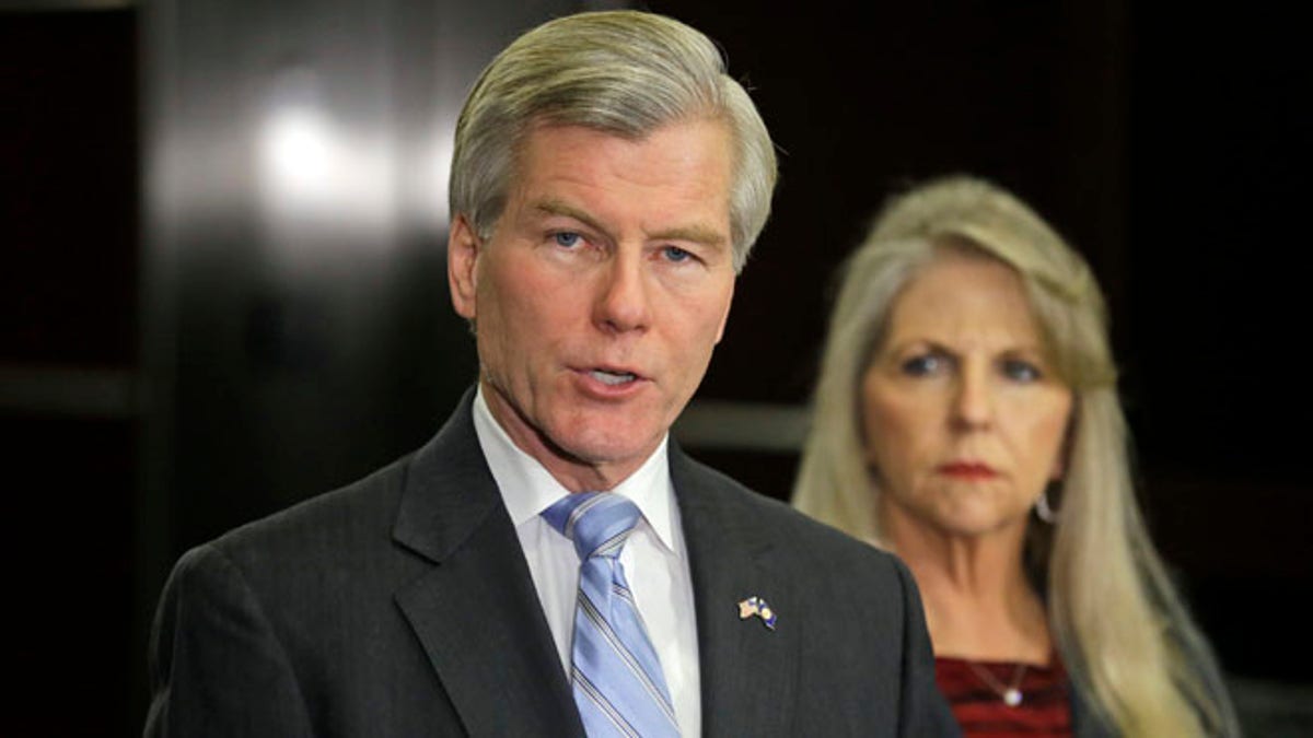 Jan. 21, 2014: Former Virginia Gov. Bob McDonnell speaks during a news conference in Richmond, Va., accompanied by his wife, Maureen.