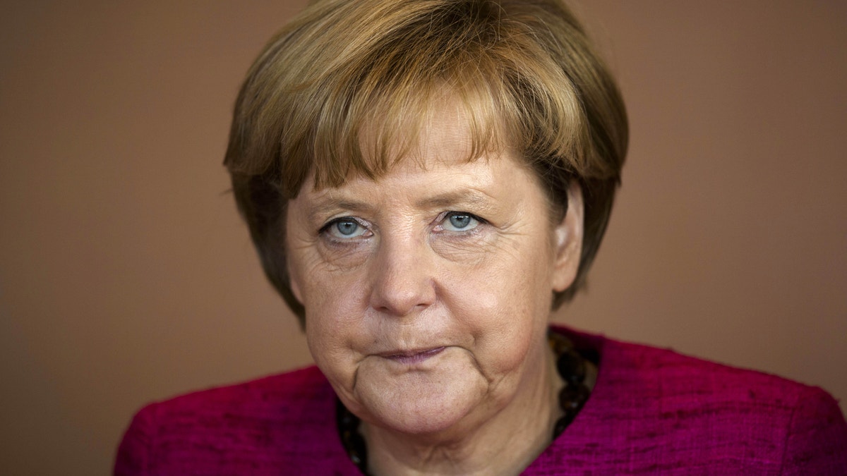 a3a11f20-Germany Merkel