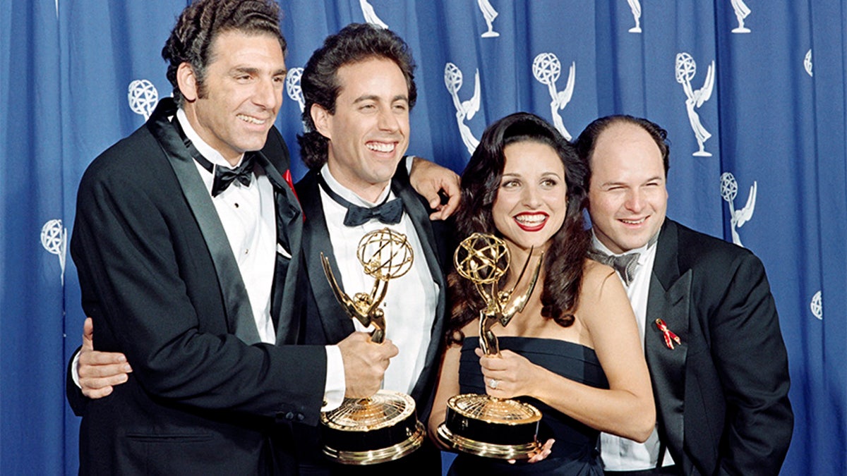 The cast of the Emmy-winning "Seinfeld" show pose with the Emmys they won for Outstanding Comedy Series on September 19, 1993 in Pasadena, CA. From left to right: Michael Richards, Jerry Seinfeld, Julia Louis-Dreyfus and Jason Alexander. (Photo credit should read SCOTT FLYNN/AFP/Getty Images)