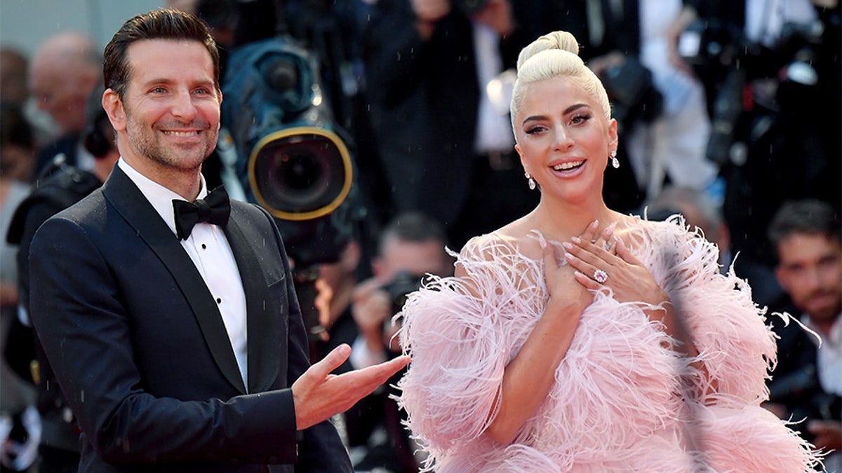 VENICE, ITALY - AUGUST 31:  Bradley Cooper and Lady Gaga walk the red carpet ahead of the 'A Star Is Born Red' screening during the 75th Venice Film Festival at Sala Grande on August 31, 2018 in Venice, Italy.  (Photo by Jacopo Raule/FilmMagic)