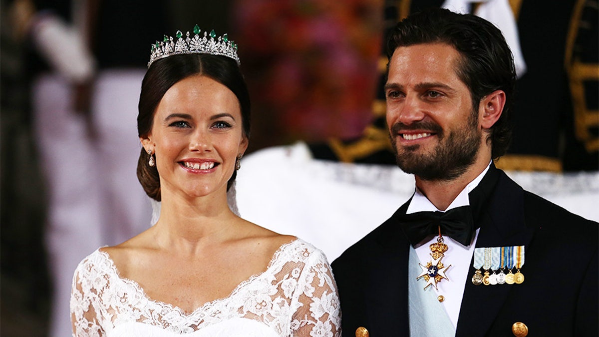 STOCKHOLM, SWEDEN - JUNE 13:  Prince Carl Philip of Sweden is seen with his new wife Princess Sofia of Sweden after their marriage ceremony on June 13, 2015 in Stockholm, Sweden.  (Photo by Andreas Rentz/Getty Images)