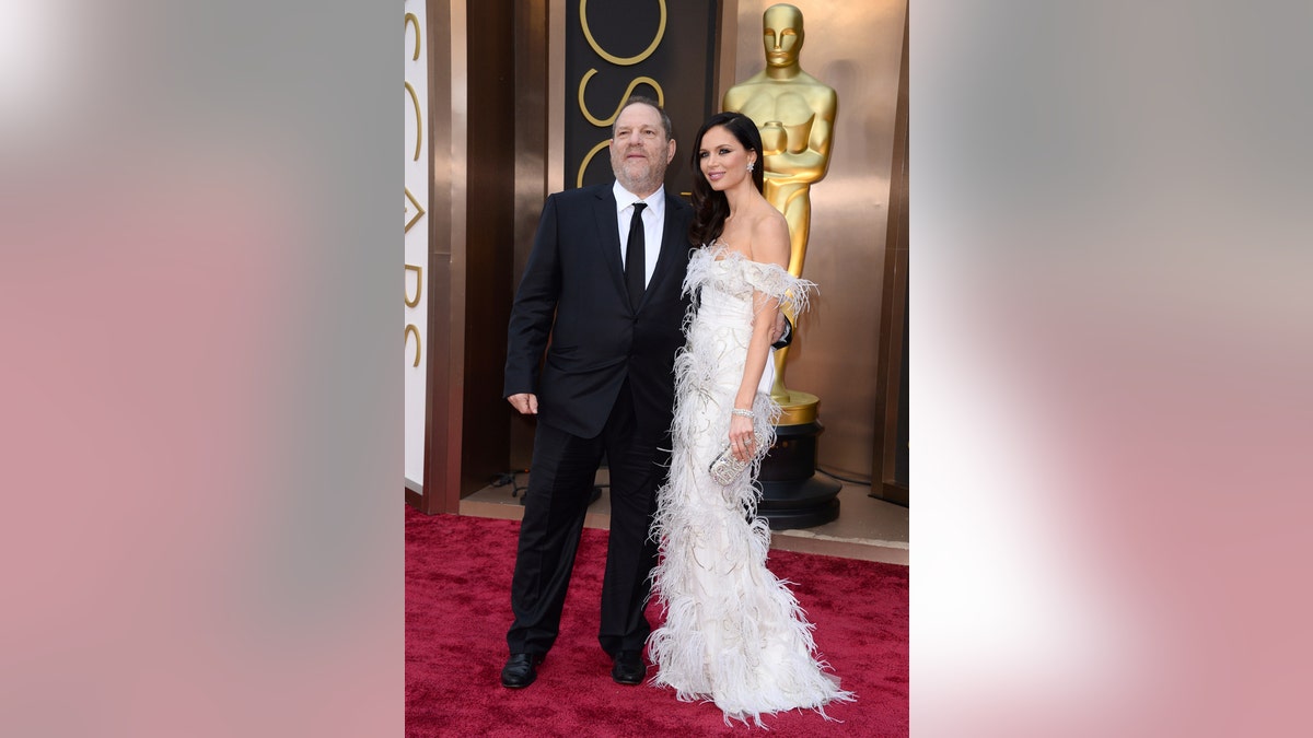 Harvey Weinstein, left, and Georgina Chapman arrive at the Oscars on Sunday, March 2, 2014, at the Dolby Theatre in Los Angeles.
