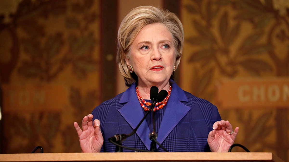 Former Secretary of State Hillary Clinton speaks at the annual Hillary Rodham Clinton awards ceremony at Georgetown University in Washington, U.S., February 5, 2018. REUTERS/Aaron P. Bernstein - RC1F5DE26B20