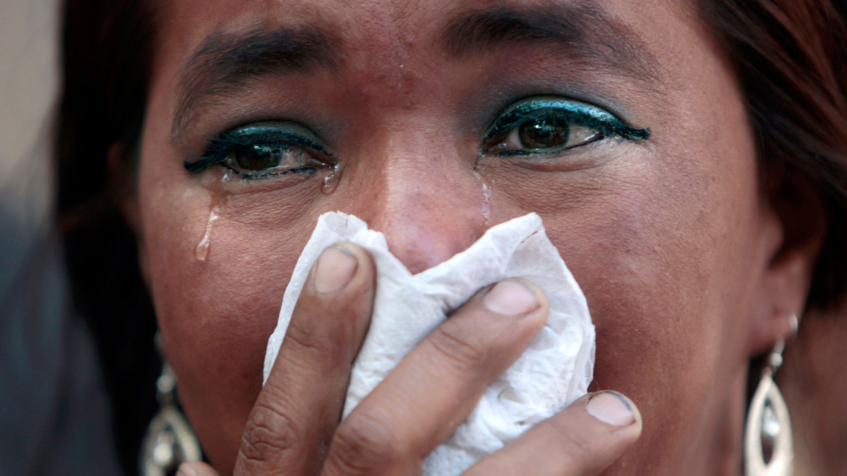 33254c7c-APTOPIX Honduras Prison Fire