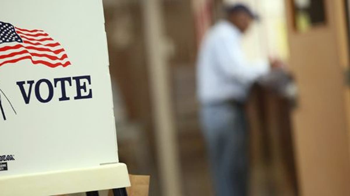 WATERLOO, IA - SEPTEMBER 27: Voting booths are set up for early voting at the Black Hawk County Courthouse on September 27, 2012 in Waterloo, Iowa. Early voting starts today in Iowa where in the 2008 election 36 percent of voters cast an early ballot. (Photo by Scott Olson/Getty Images)