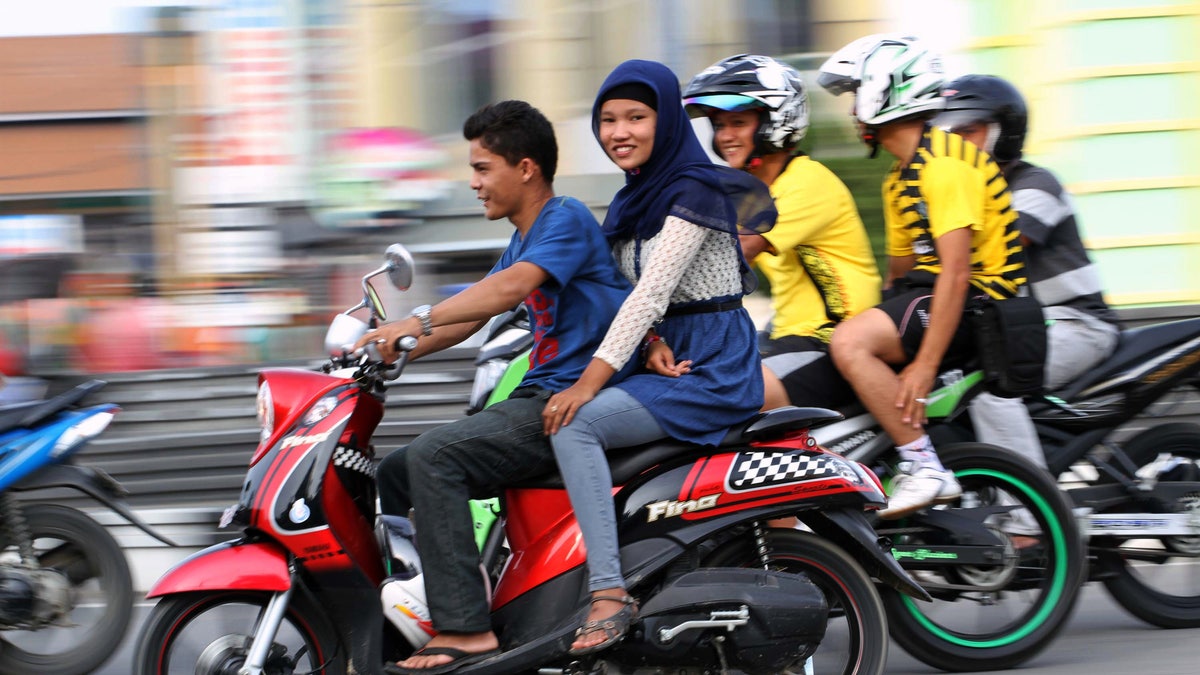 Indonesia Motorbike Straddling