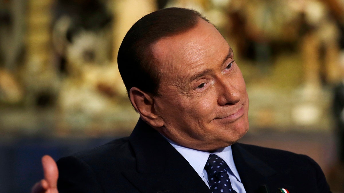 f1d1e71b-Italy Berlusconi