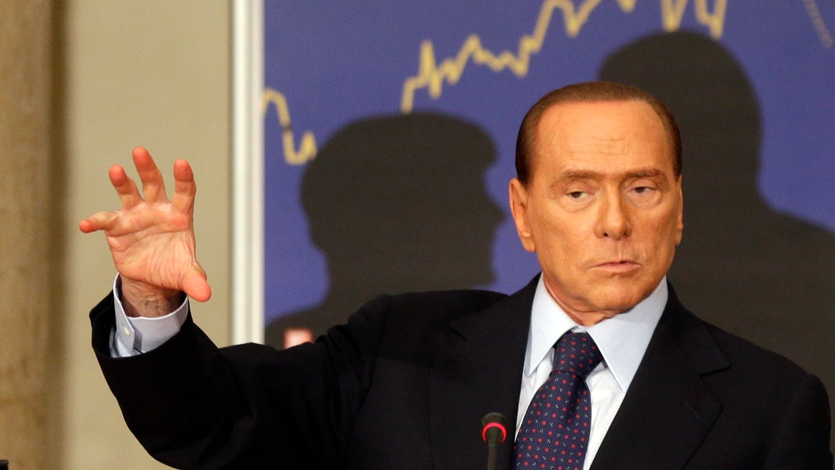 baa4124b-Italy Berlusconi
