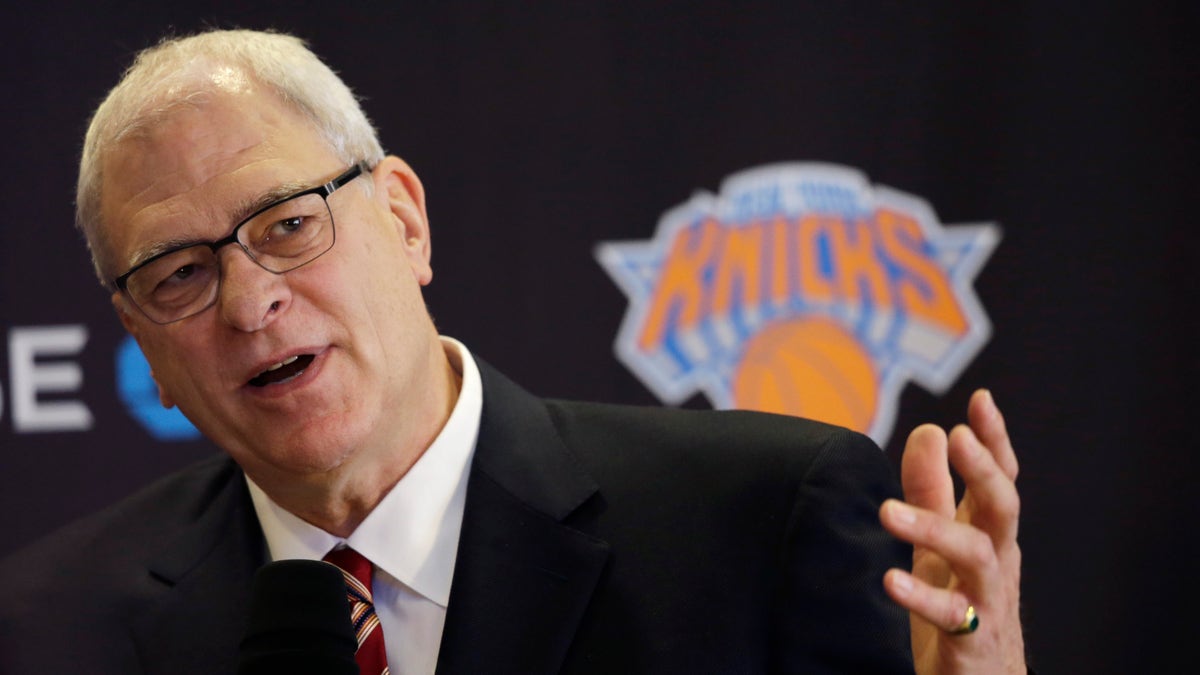 Phil Jackson, the new president of the New York Knicks, answers questions during a news conference, Tuesday, March 18, 2014 in New York. Jackson, who won two NBA titles as a player with the Knicks, also won 11 championships while coaching the Chicago Bulls and the Los Angeles Lakers. (AP Photo/Mark Lennihan)