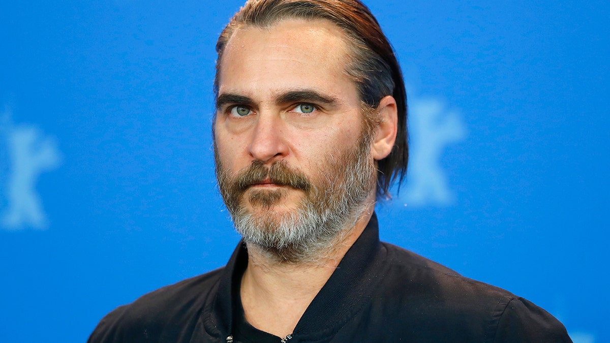 Actor Joaquin Phoenix poses during a photocall to promote the movie Don't Worry, He Won't Get Far on Foot at the 68th Berlinale International Film Festival in Berlin, Germany, February 20, 2018.