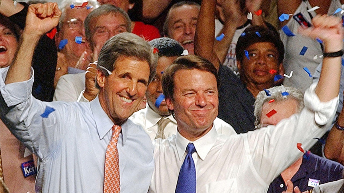Sen. John Kerry, D-Mass., left, and his running mate, Sen. John Edwards D-NC., wave to the crowd during a campaign speech in St. Petersburg, Fla. in this July 7, 2004 file photo
