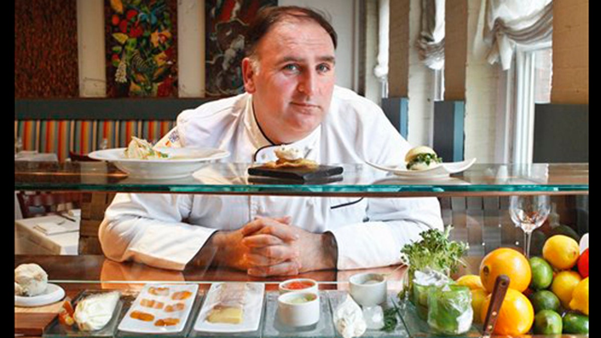 FILE- This Tuesday, March 15, 2011 file photo shows chef Jose Andres at his Minibar restaurant in Washington. Small plates have earned Jose Andres one of the food worldâs biggest honors. The man credited with popularizing tapas _ the Spanish custom of dining on small, shared plates _ was named the nationâs most outstanding chef Monday during the James Beard Foundationâs annual awards ceremony, the so-called Oscars of the culinary crowd. (AP Photo/Jacquelyn Martin, FILE)
